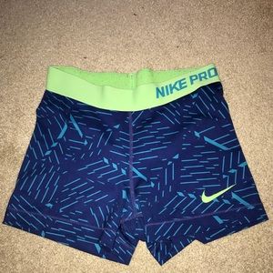 Blue and green Nike Pro spandex